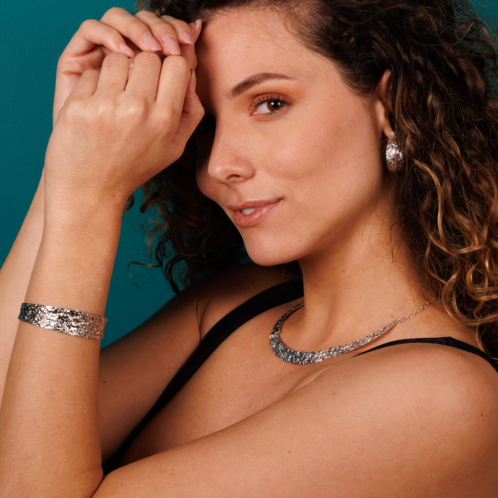 Braccale rgdo con ganco e anello n argento sterlng martellato Braccale rgdo con ganco e anello n argento sterlng martellato